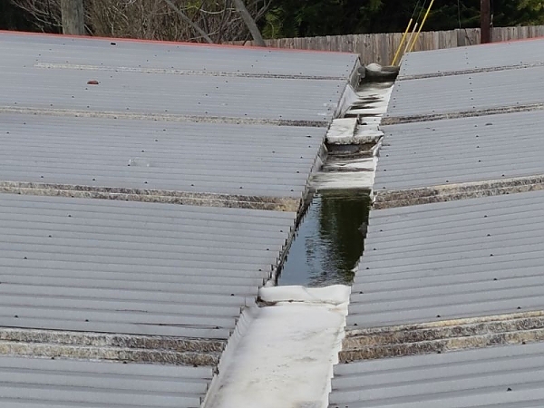 Failing Commercial Roof Deck and Internal Drainage